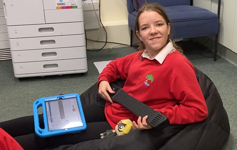 Student playing with accessible instruments